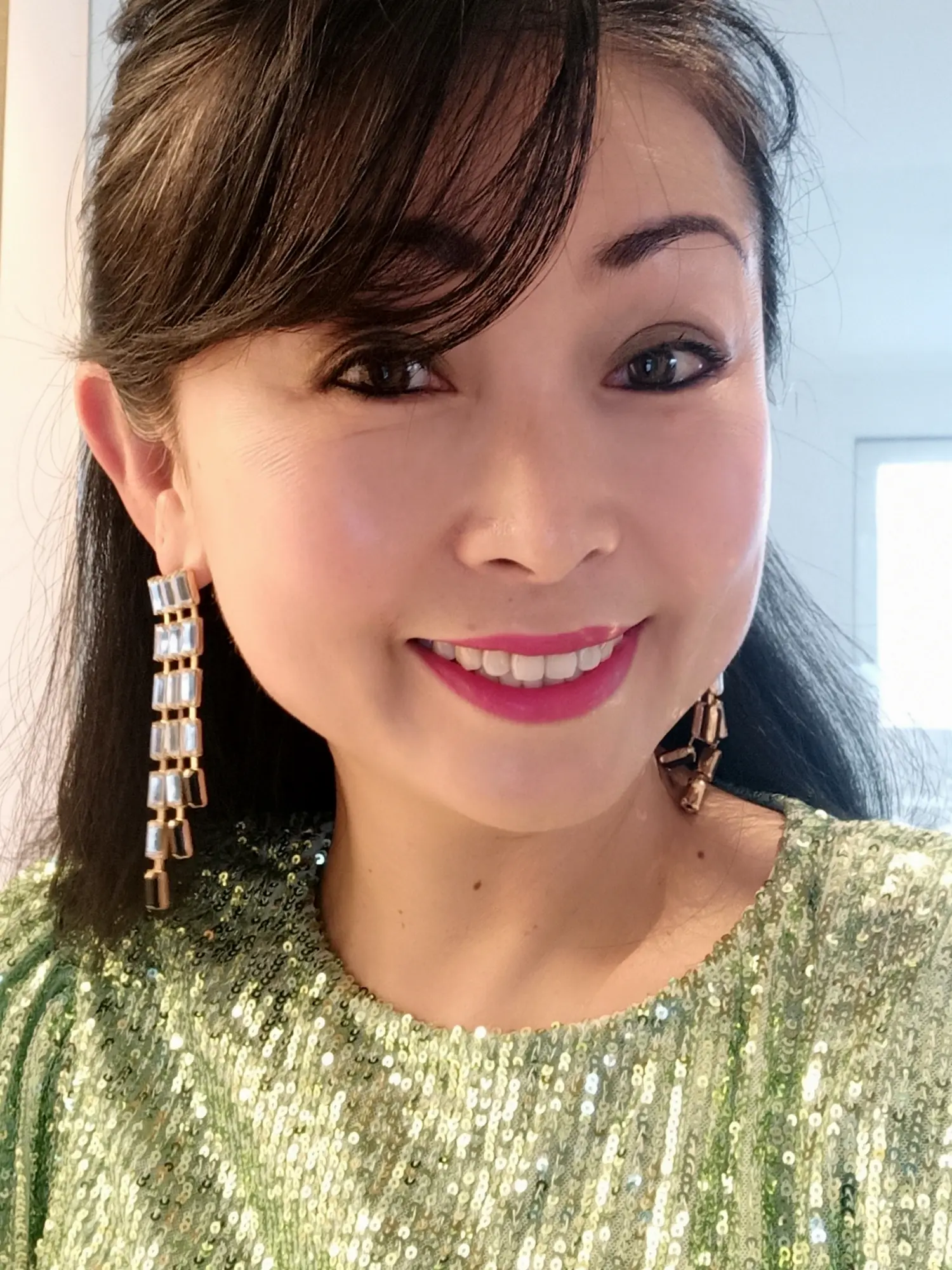 Carolyne Yau photo green dress