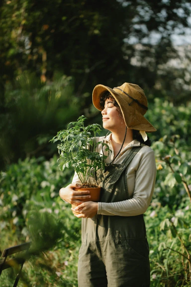 Woman in the garden holding flowers